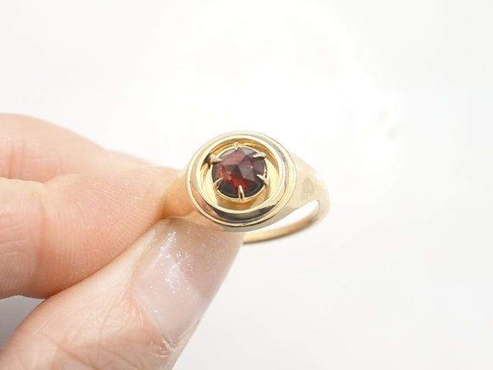 The Garnet Orbit Signet