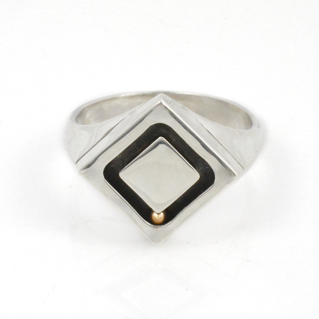 Silver signet ring with a rolling gold marble. A unique men's anxiety ring. 