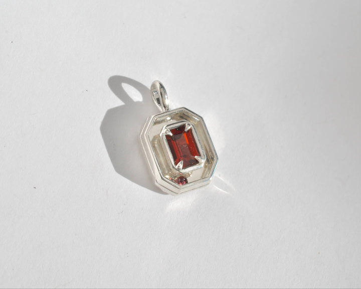Garnet Orbit Charm 07