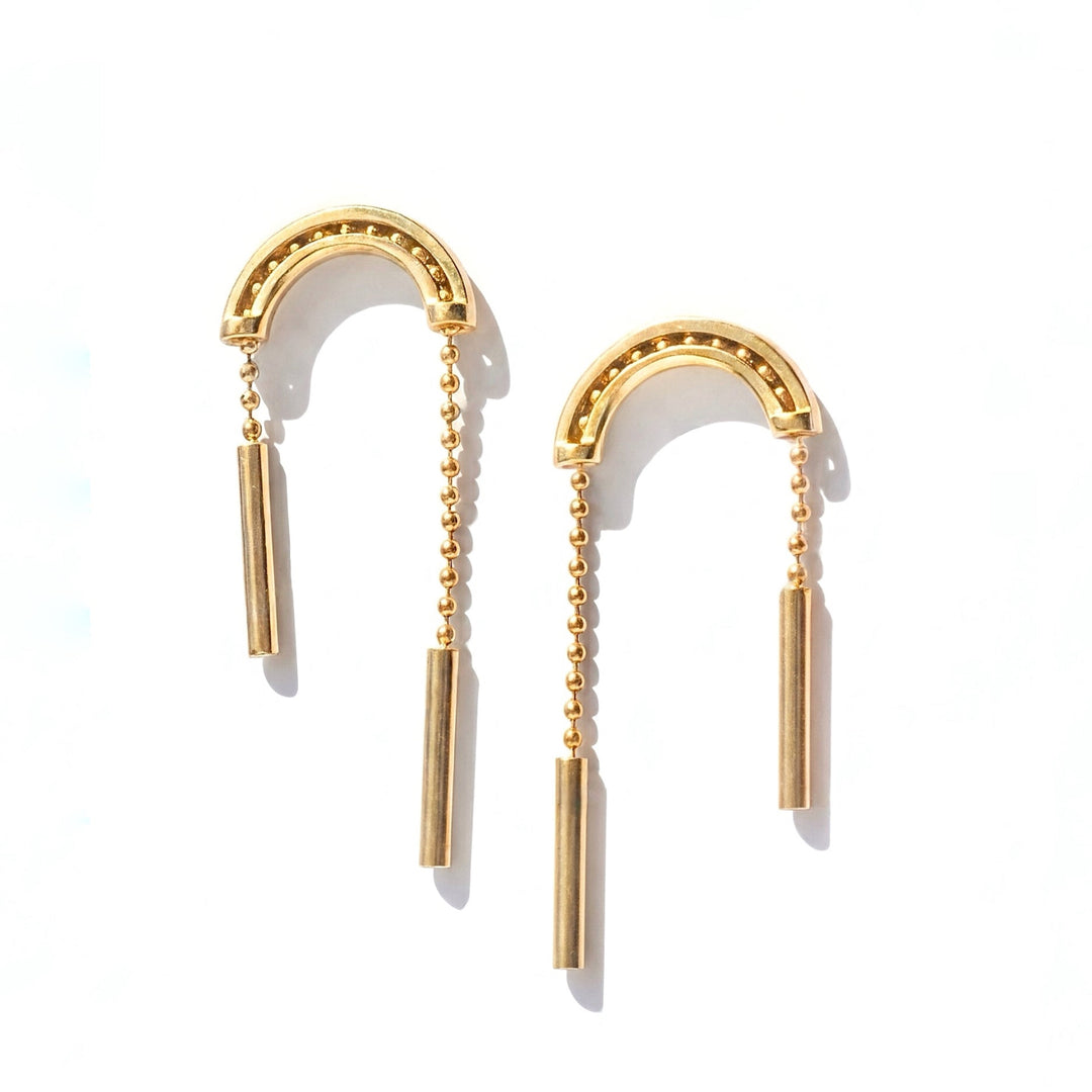 the kinetic pulley earrings with moving chains in gold by Emma Brooke jewelry