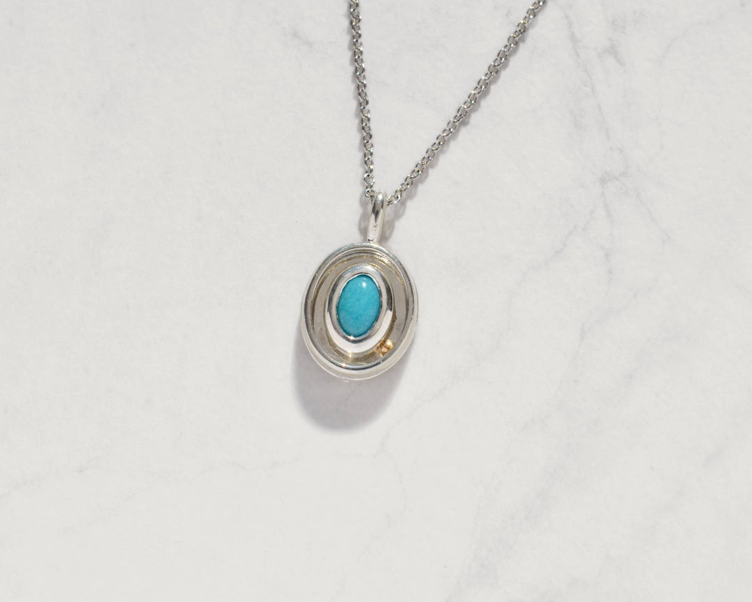 Turquoise Orbit Charm 06
